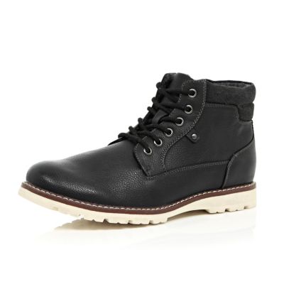 Black cleated sole hiker boots